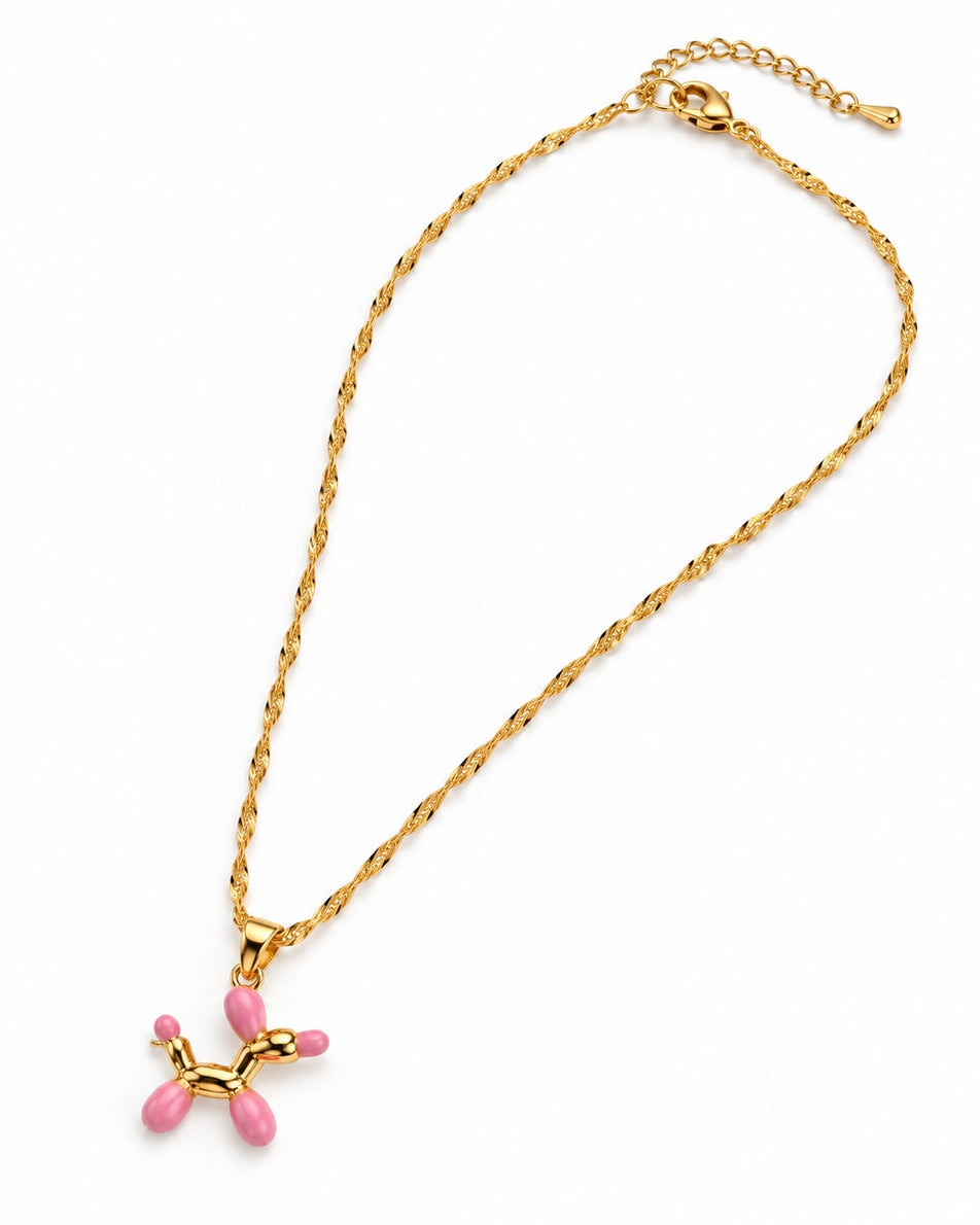 Collar perrito globo dorado con rosa, vista en ángulo sobre fondo blanco
